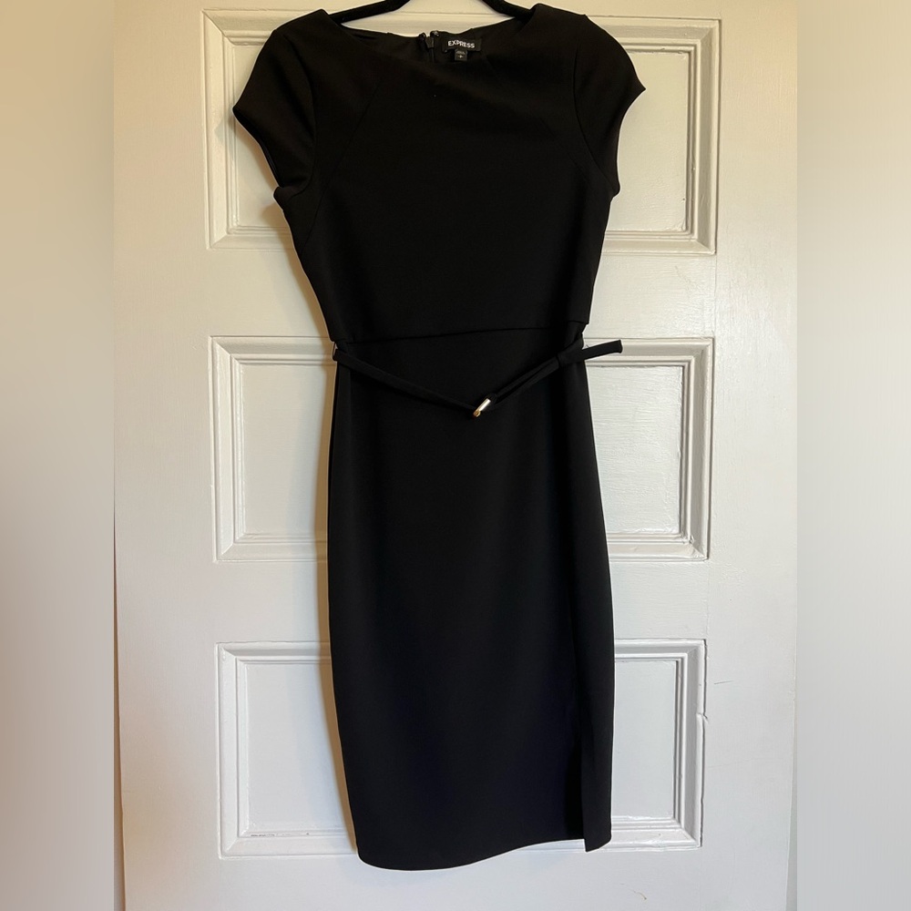 Express black boat neck dress with gold buckle detail. Never worn